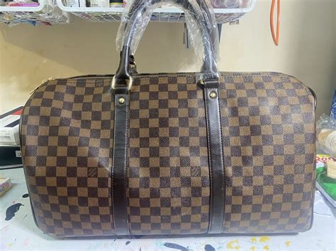 geanta de voiaj louis vuitton